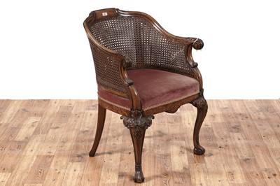 Lot 427 - An attractive carved walnut bergère armchair