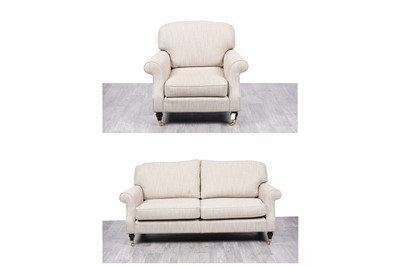 Lot 4 - Delcor: a three seater sofa and the matching armchair