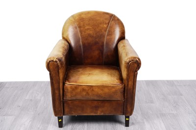 Lot 2 - A brown leather club armchair