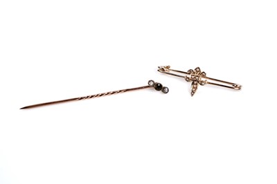Lot 573 - An Edwardian stick pin; and a seed pearl fleur-de-lis brooch