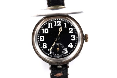 Lot 278 - An early 20th Century silver cased half hunter trench wristwatch
