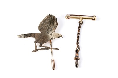 Lot 206 - A yellow gold bird pattern tie pin; and a dog clip clasp brooch