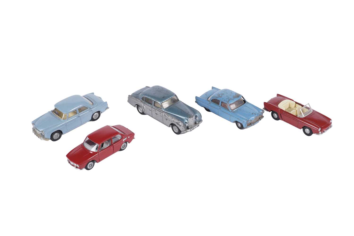Lot 85 - A Tekno Saab 99; and four unboxed Tri-Ang Spot-On diecast cars