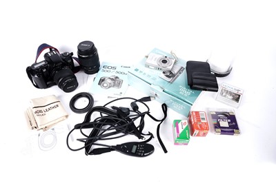 Lot 165 - Two Canon cameras; and accessories
