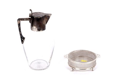 Lot 344 - An Edwardian claret jug; and an Edwardian silver bon bon dish