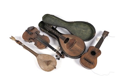 Lot 561 - A 'The International No. 200' flat back six-string mandolin; and others