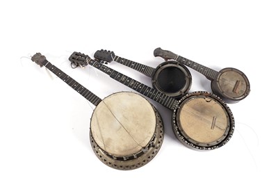 Lot 567 - A British six-string zither banjo; and three others