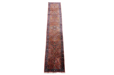 Lot 1187 - An early 20th Century Persian hand-knotted Mahal runner