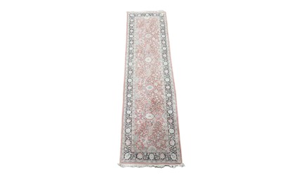 Lot 1190 - A Persian pure silk hand-knotted Kashan runner