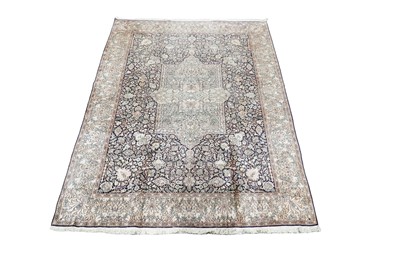 Lot 1192 - A Persian silk hand-knotted Kashan carpet