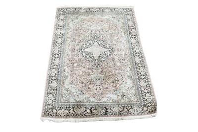 Lot 1193 - A Persian pure silk hand-knotted carpet