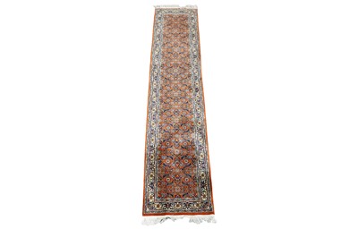 Lot 1194 - A Persian hand-knotted Kashan runner
