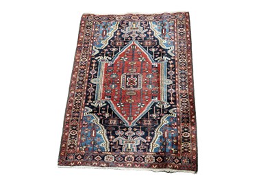 Lot 1201 - An early 20th Century Persian hand-knotted Vasleghand rug
