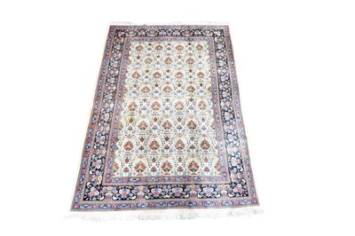 Lot 975 - A Persian hand-knotted Kashan carpet
