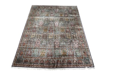 Lot 1216 - A Persian hand-knotted silk carpet