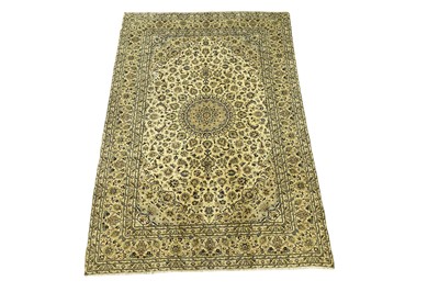 Lot 1171 - A Persian hand-knotted Kashan carpet