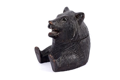 Lot 688 - A Black Forest carved inkwell in the form of a bear
