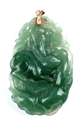 Lot 126 - A Chinese carved jade pendant