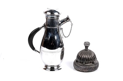 Lot 817 - A silver plated cocktail shaker and a silver plated table bell