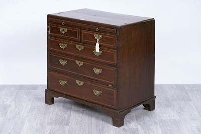 Lot 110 - A George III inlaid mahogany bachelor’s chest of drawers