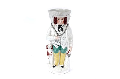 Lot 1085 - A Staffordshire character jug