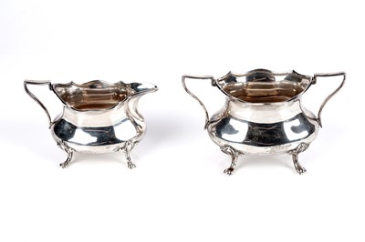 Lot 380 - A George V silver cream jug and sugar bowl