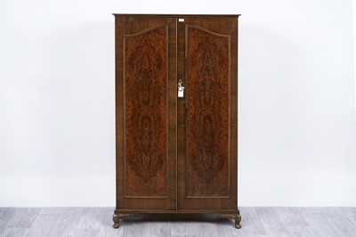 Lot 94 - Likely Bevan Funnell: a burr walnut and mahogany banded wardrobe