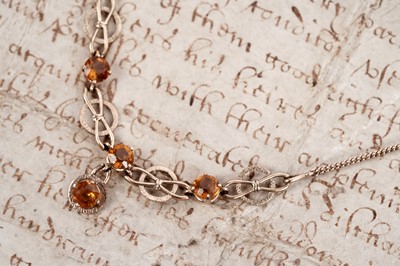 Lot 679 - A citrine pendant necklet