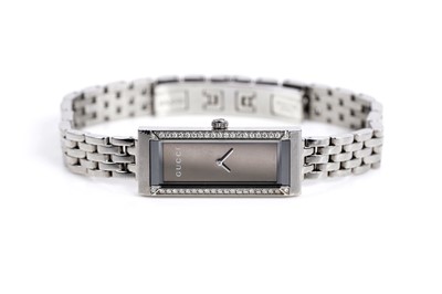 Lot 794 - A Gucci diamond stainless steel cocktail watch