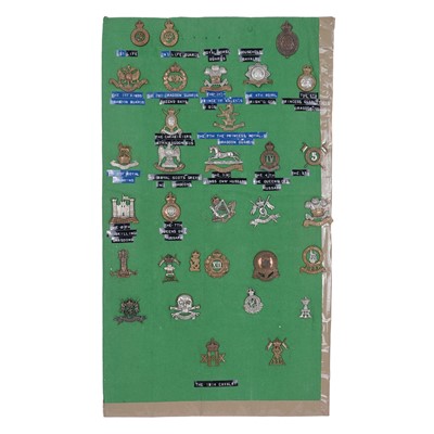 Lot 86 - A display of British regimental cap badges