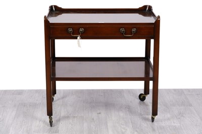 Lot 82 - Attributed to Bevan Funnell: a reproduction style mahogany two tier trolley