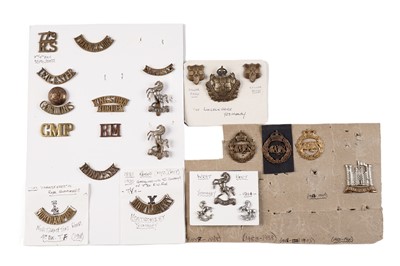 Lot 109 - A selection of British military cap badges, collar badges, titles and buttons