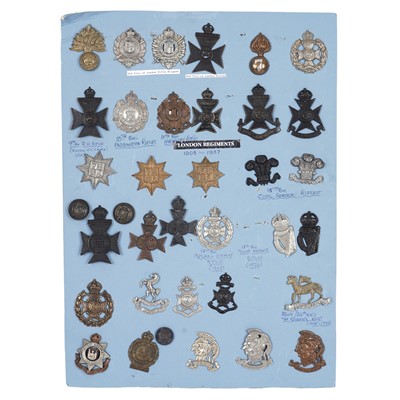 Lot 120 - A display of London regimental cap badges