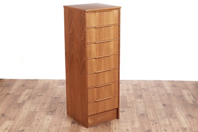Lot 544 - A Mid-Century teak tall boy chest of drawers