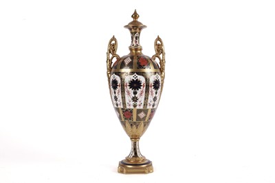 Lot 834 - A Royal Crown Derby Old Imari twin handled vase and cover