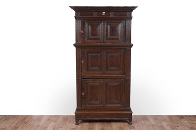 Lot 472 - A Georgian carved oak press cupboard