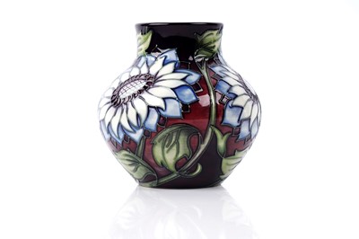 Lot 909 - A boxed Moorcroft trial piece vase