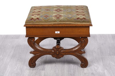 Lot 20 - A Victorian carved oak ottoman