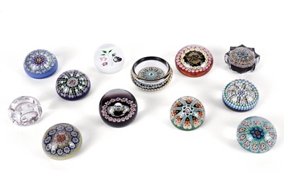 Lot 885 - A collection of glass paperweights