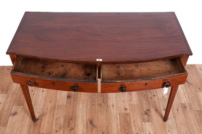 Lot 484 - A George III inlaid mahogany bow front serving/side table