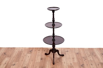 Lot 490 - A Georgian style mahogany three tier dumb waiter