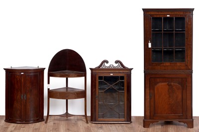 Lot 491 - A Georgian mahogany corner cabinet; and three other cabinets