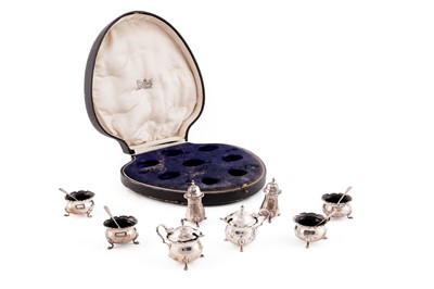Lot 873 - A cased silver condiment set, by Adie Brothers