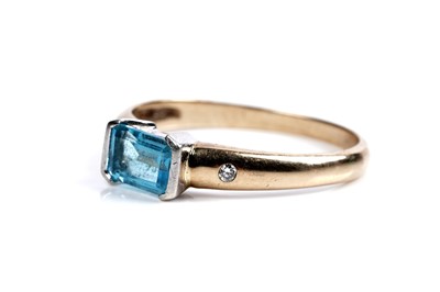 Lot 127 - A modern topaz and diamond ring