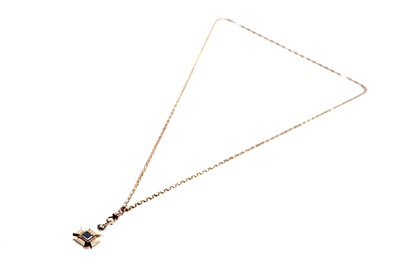 Lot 501 - A Victorian cross pattée mourning pendant or fob
