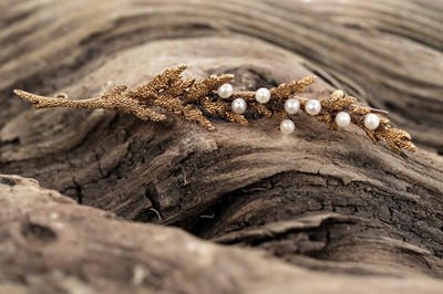Lot 506 - A 15ct gold pearl dew-drop fern pattern brooch