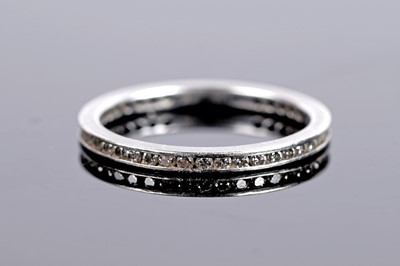 Lot 541 - A contemporary Theo Fennell diamond eternity ring