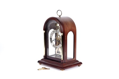 Lot 608 - Hermle: a German skeletonised mahogany and brass 30-hour mantel clock