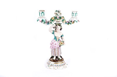 Lot 758 - An English double-branch figural candlestick
