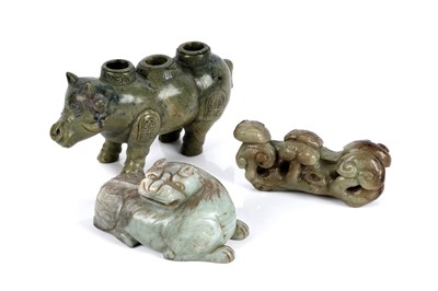 Lot 719 - Three carved hardstone figures